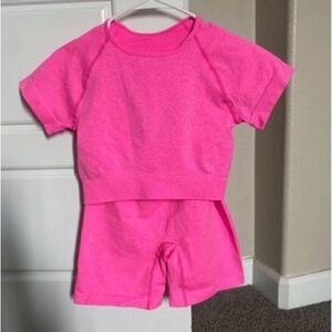 Amazon Active Set. Hot pink shirt and biker shorts set.
